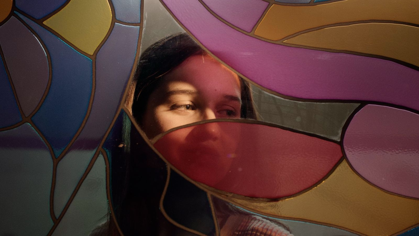 Cracks run through this multicolored glass