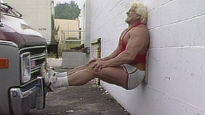 Ken Patera performs feats of strength