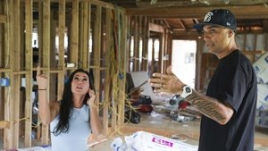 House Held Up by Car Jacks